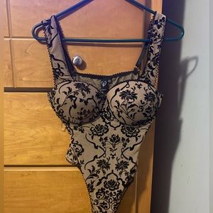 Tan and black bodysuit